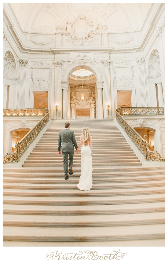 Bride and Groom Walking up Steps at San Francisco City Hall