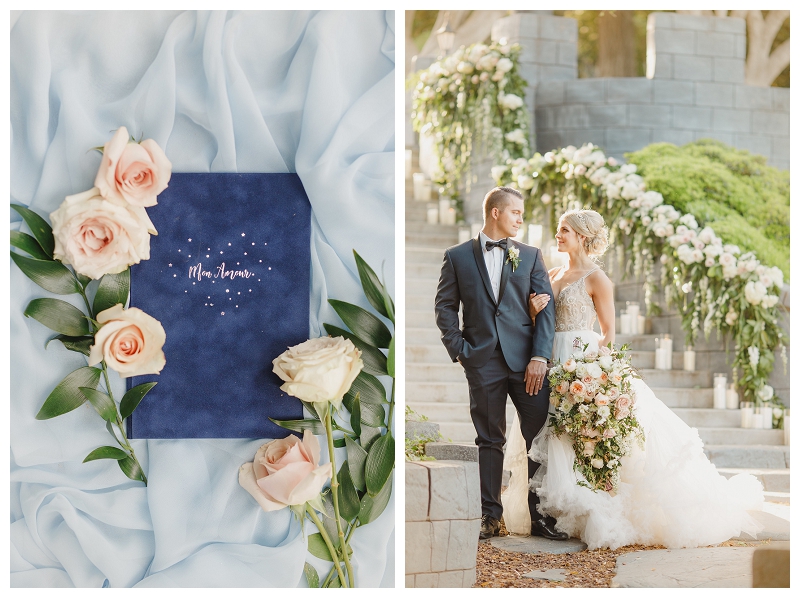 custom designed vow book in midnight blue with gold stars and cursive text, shown with blush roses