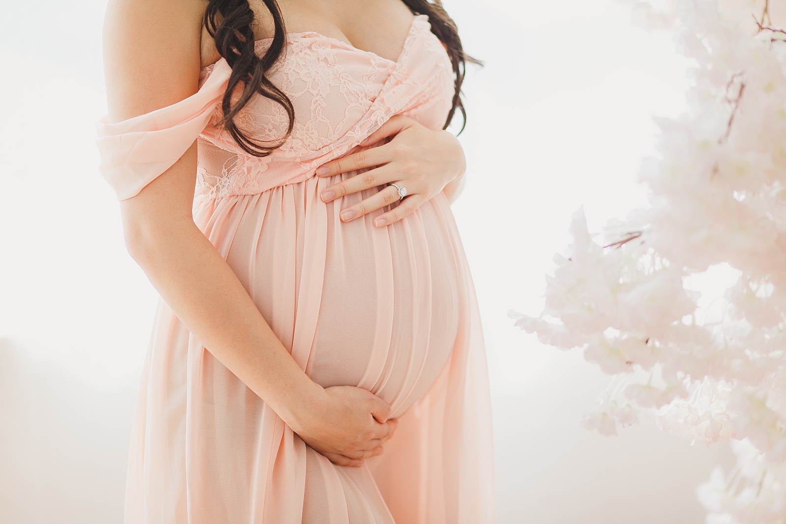 Romantic maternity photos in pink gown